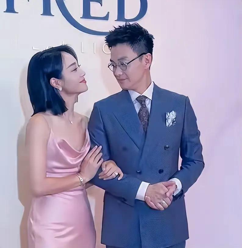 周一围朱丹夫妻档_周一围朱丹时尚选择_周一围朱丹结婚照 新闻